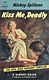 <em>Kiss Me Deadly,</em> by Mickey Spillane, published Sep. 1, 1967 by Signet.<br><br>Jeffrey MacDonald claims to have been reading this book about 1:00 - 2:00 a.m. on the morning of the murders.