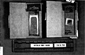 AFDIL Photo depicting two open cardboard slide mailers each containing the same glass microscope slides (depicted in GPS Photo #70), but in the reverse order and with additional AFDIL markings: (Left) 'H L2082 Q79 PMS MPM' - '99C O438-75A...', (Right) 'F.F's- L2082- Q79 PMS MPM' - '99C-O438 76A 5.19.99...'; and scale marked: 'AFD1L # 99C-O438 75A &76A'