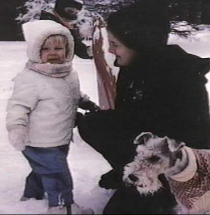 Contrary to Jeffrey MacDonald's assertion that the unidentified dark woolen fibers found at the scene could not have belonged to anyone in his family -- and must have come from the the dark clothes of the 'hippie intruders' -- this family photograph shows Colette (with baby Kristen) in a dark coat and knit hat.